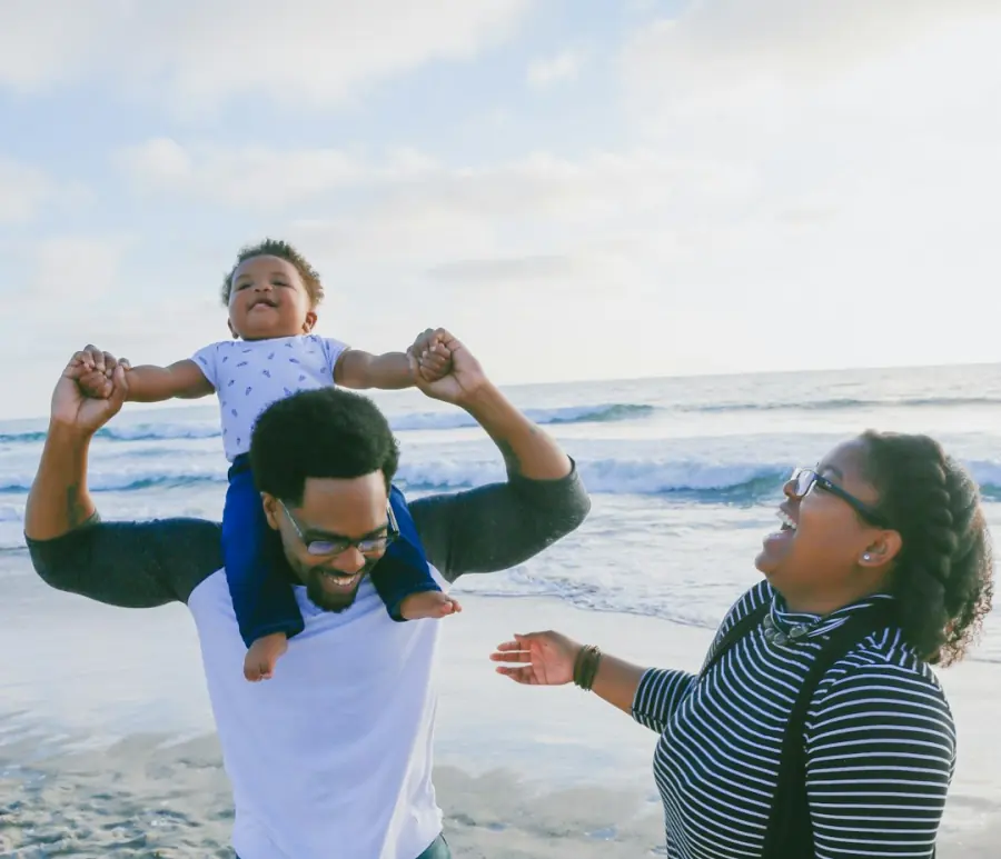 African family enjoying a beach holiday together
